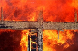 Window Pane Cross Engulfed in Flame