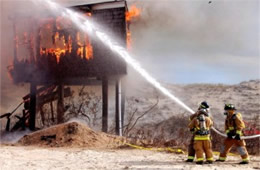 Firefighters Train at a Beach House Live Burn