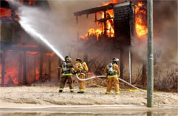 Firefighters Train at a Beach House Live Burn