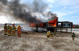 Firefighters Train at a Beach House Live Burn