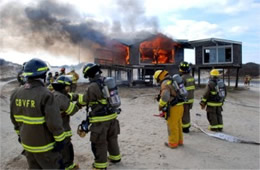 Firefighters Train at a Beach House Live Burn