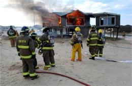 Firefighters Train at a Beach House Live Burn