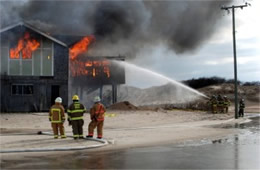 Firefighters Train at a Beach House Live Burn