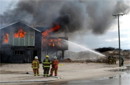 Firefighters Train at a Beach House Live Burn