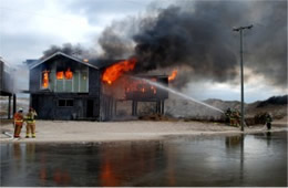 Firefighters Train at a Beach House Live Burn