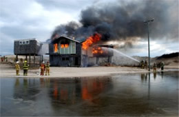 Firefighters Train at a Beach House Live Burn