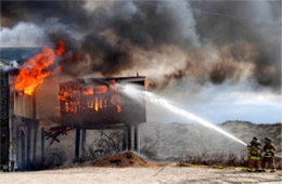 Firefighters Train at a Beach House Live Burn