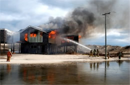 Firefighters Train at a Beach House Live Burn