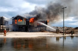 Firefighters Train at a Beach House Live Burn