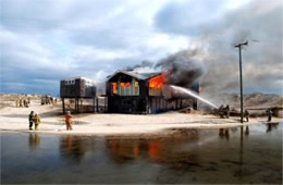 Firefighters Train at a Beach House Live Burn