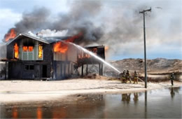 Firefighters Train at a Beach House Live Burn