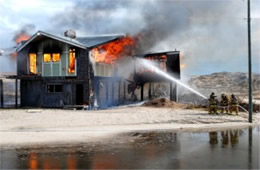 Firefighters Train at a Beach House Live Burn