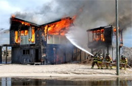 Firefighters Train at a Beach House Live Burn