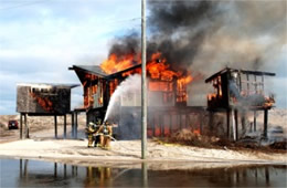 Firefighters Train at a Beach House Live Burn