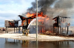 Firefighters Train at a Beach House Live Burn