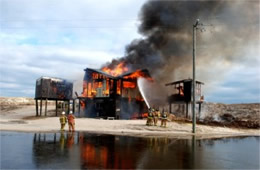 Firefighters Train at a Beach House Live Burn