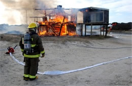 Firefighters Train at a Beach House Live Burn