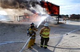 Firefighters Train at a Beach House Live Burn